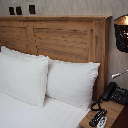Villa Toscana Hotel And Suits Lagos Bagian luar foto