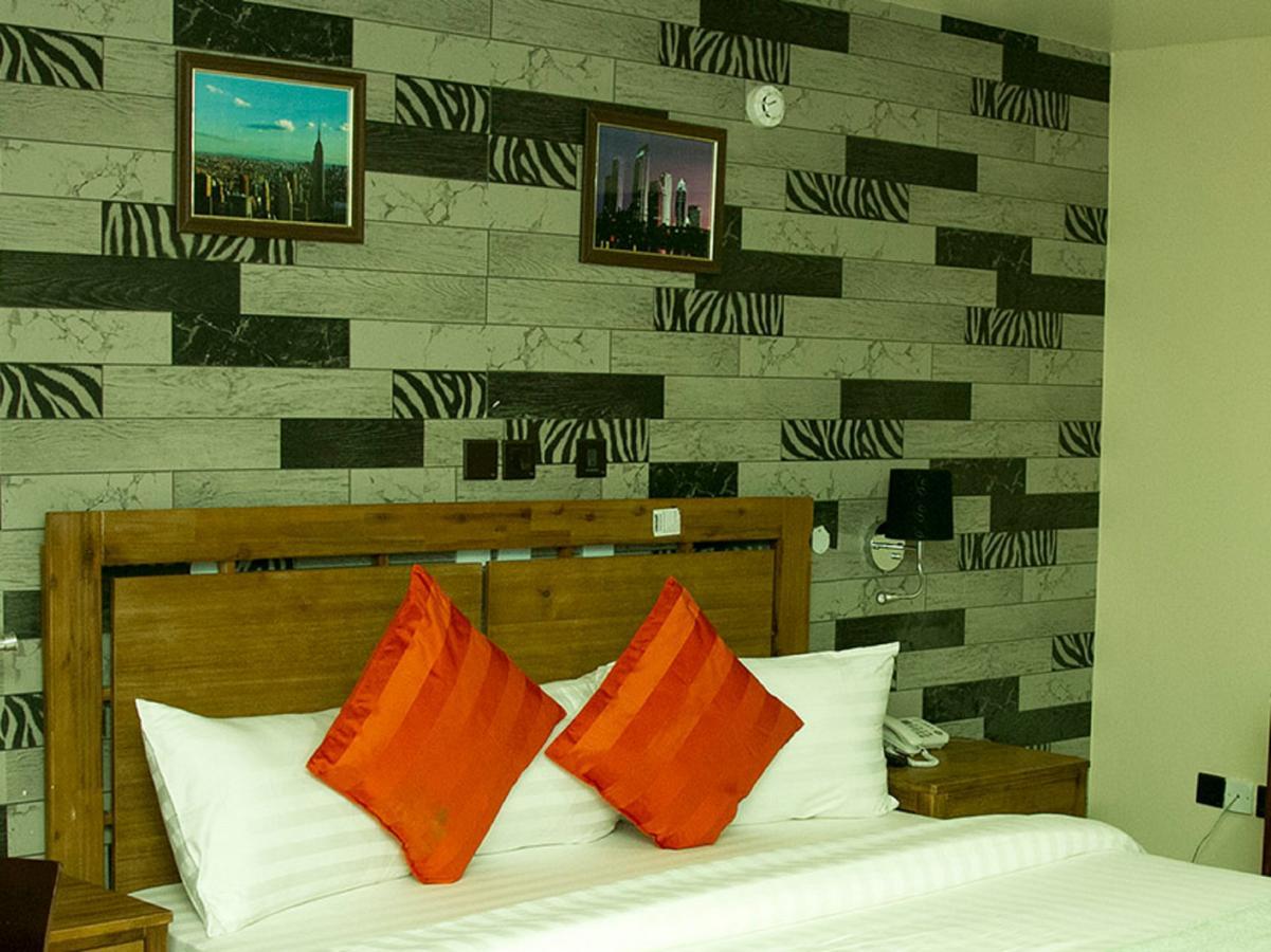 Villa Toscana Hotel And Suits Lagos Bagian luar foto