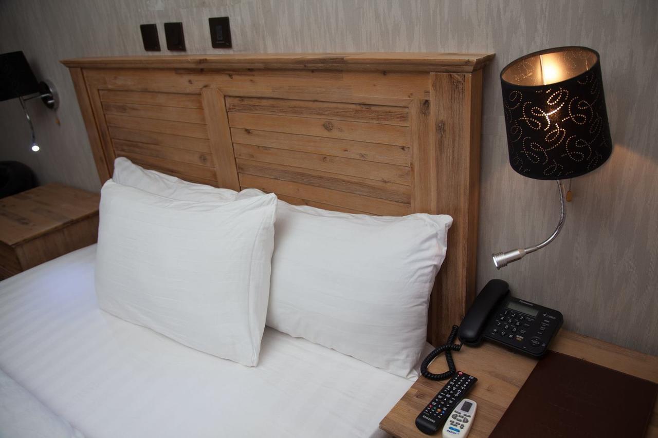 Villa Toscana Hotel And Suits Lagos Bagian luar foto
