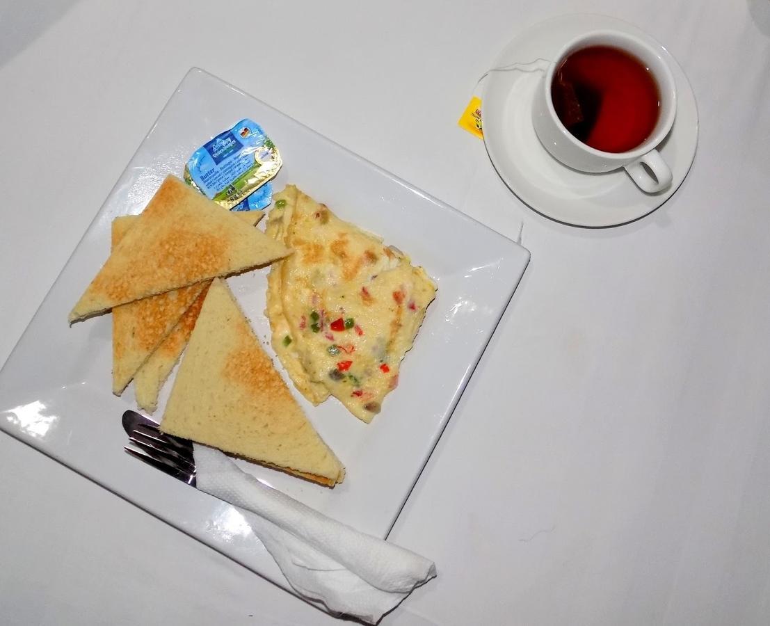 Villa Toscana Hotel And Suits Lagos Bagian luar foto